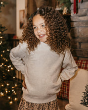 Child fleece in natural with printed ginger bread family pattern, shown on model – Little Mama Shirt Shop