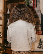 Child fleece in natural with printed ginger bread family pattern, shown on model – Little Mama Shirt Shop