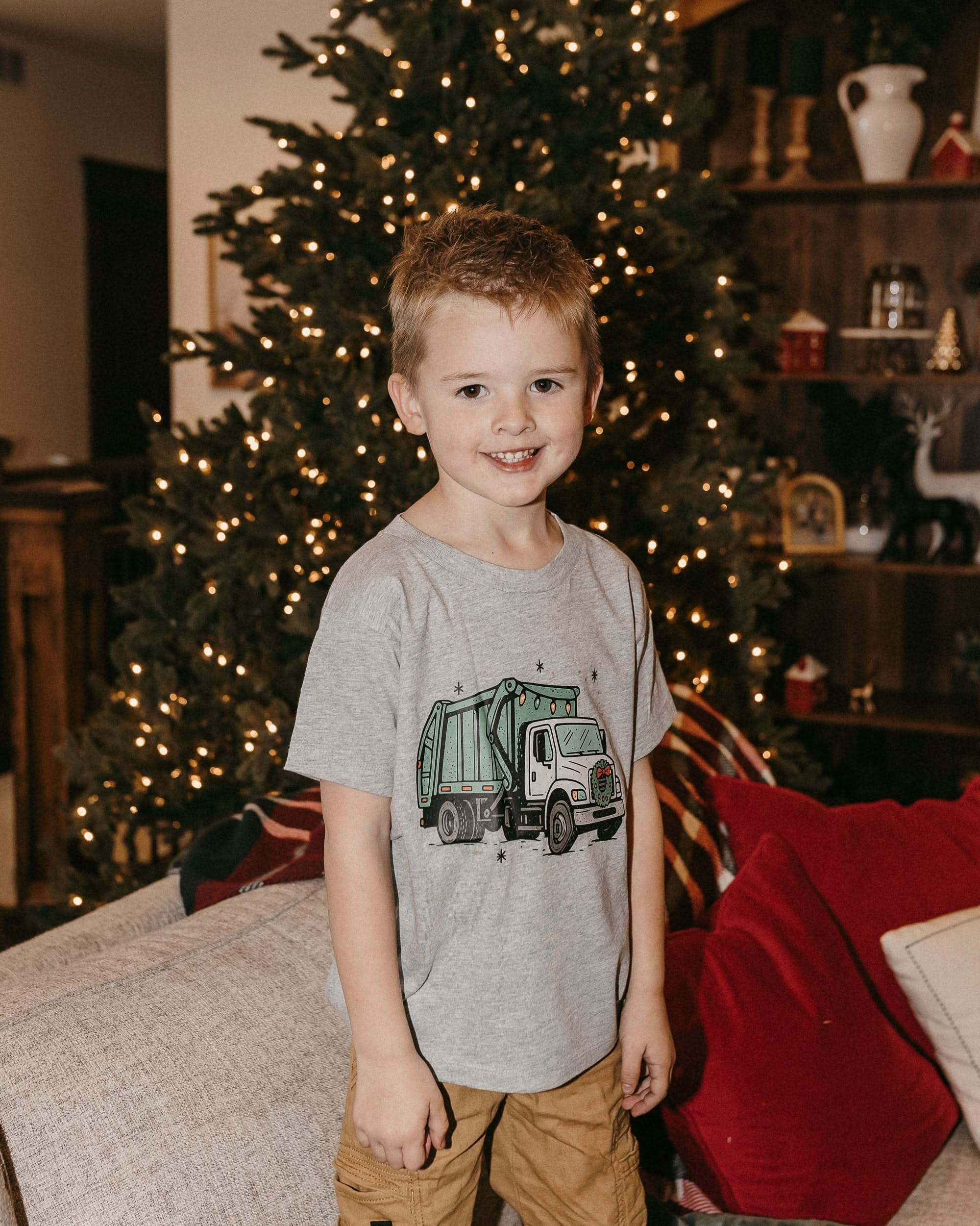 Child tee in gray with Christmas Garbage Truck on front, shown on model – Little Mama Shirt Shop