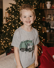 Child tee in gray with Christmas Garbage Truck on front, shown on model – Little Mama Shirt Shop