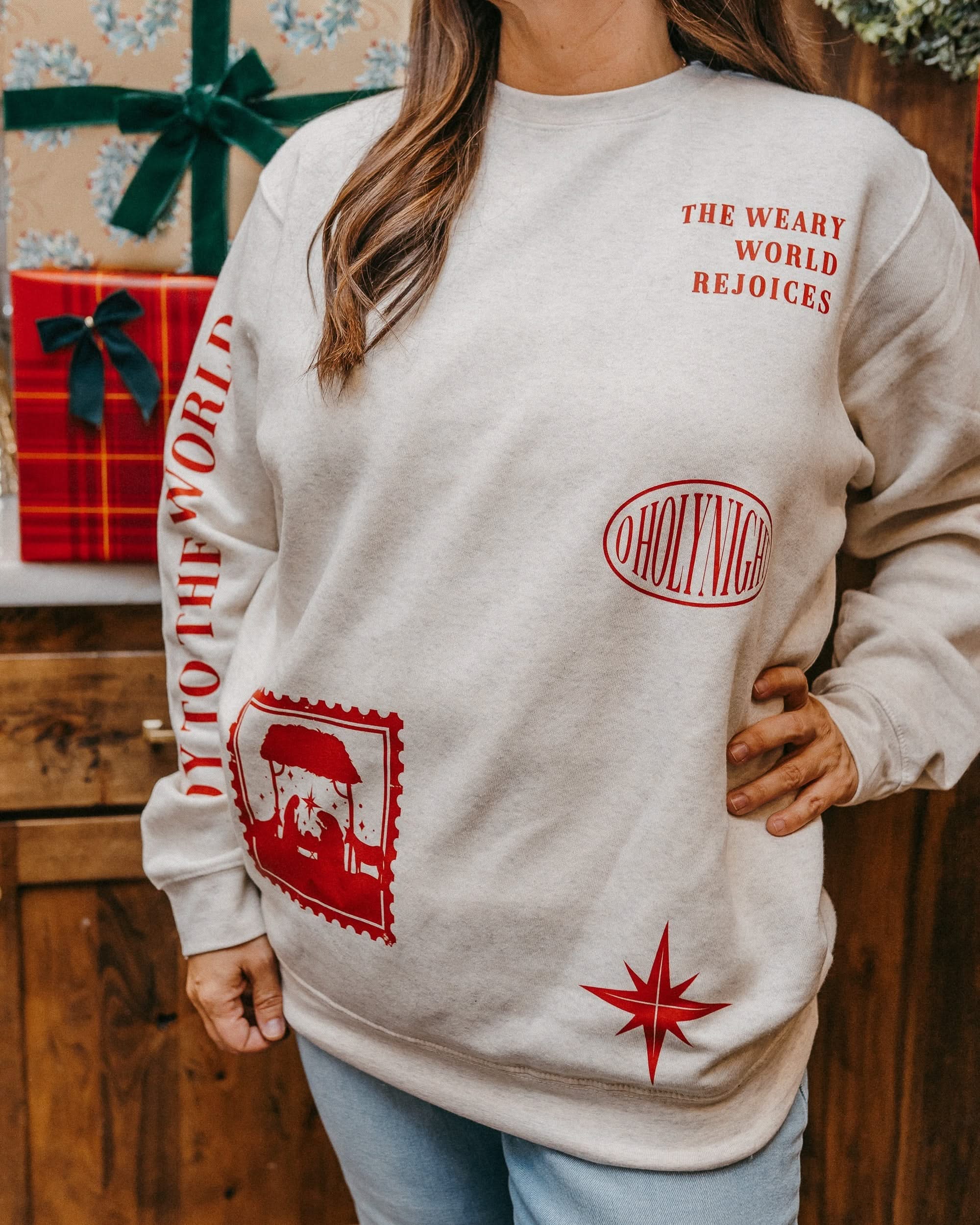 Adult sweater in natural with Christian Christmas graphics on the front, shown on model – Little Mama Shirt Shop