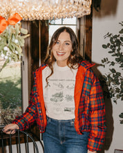 Adult long sleeve comfort colors tee in ivory with old fashioned family christmas graphic on the front, shown on model – Little Mama Shirt Shop