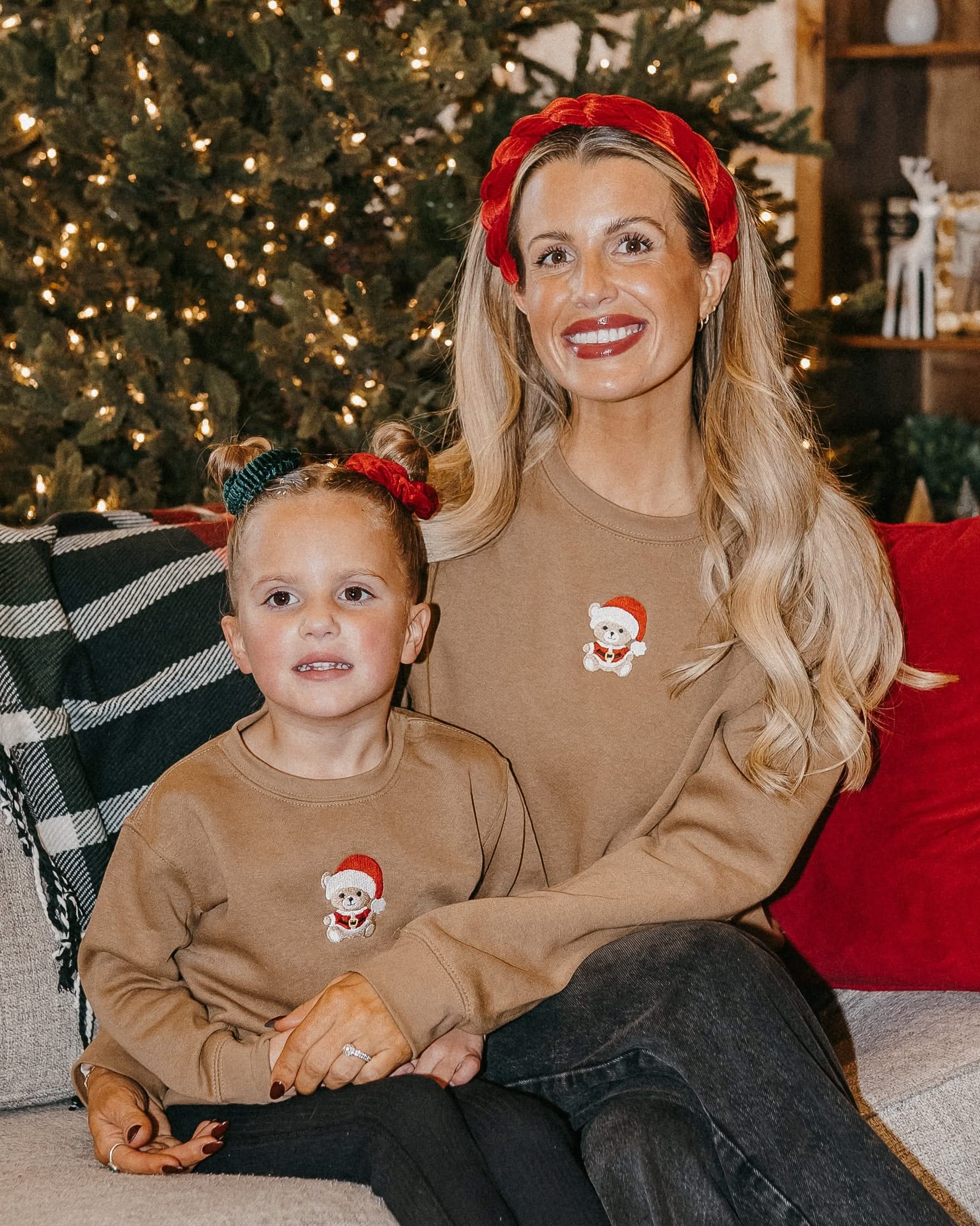 Kids and adult sweater in coyote brown with embroidered Santa teddy bear on front, shown on model – Little Mama Shirt Shop