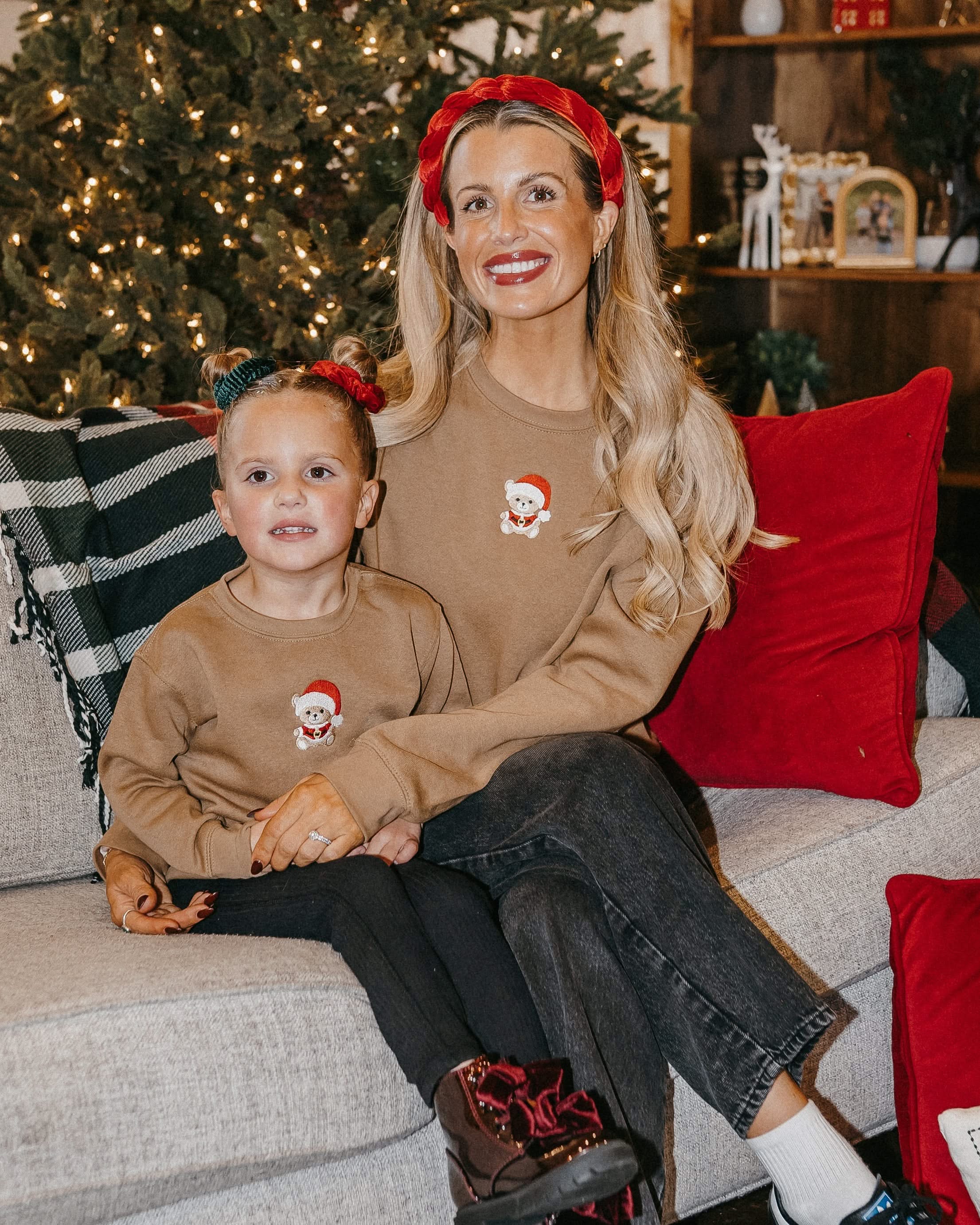 Adult and kid sweater in coyote brown with embroidered Santa teddy bear on front, shown on model – Little Mama Shirt Shop