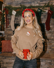 Adult sweater in coyote brown with embroidered Santa teddy bear on front, shown on model – Little Mama Shirt Shop