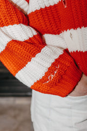 Adult candy cane cardigan with 'mother' embroidered on sleeve, shown on model – Little Mama Shirt Shop