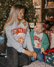 Adult and child gray sweaters with merry Christmas teddy graphic, shown on models – Little Mama Shirt Shop