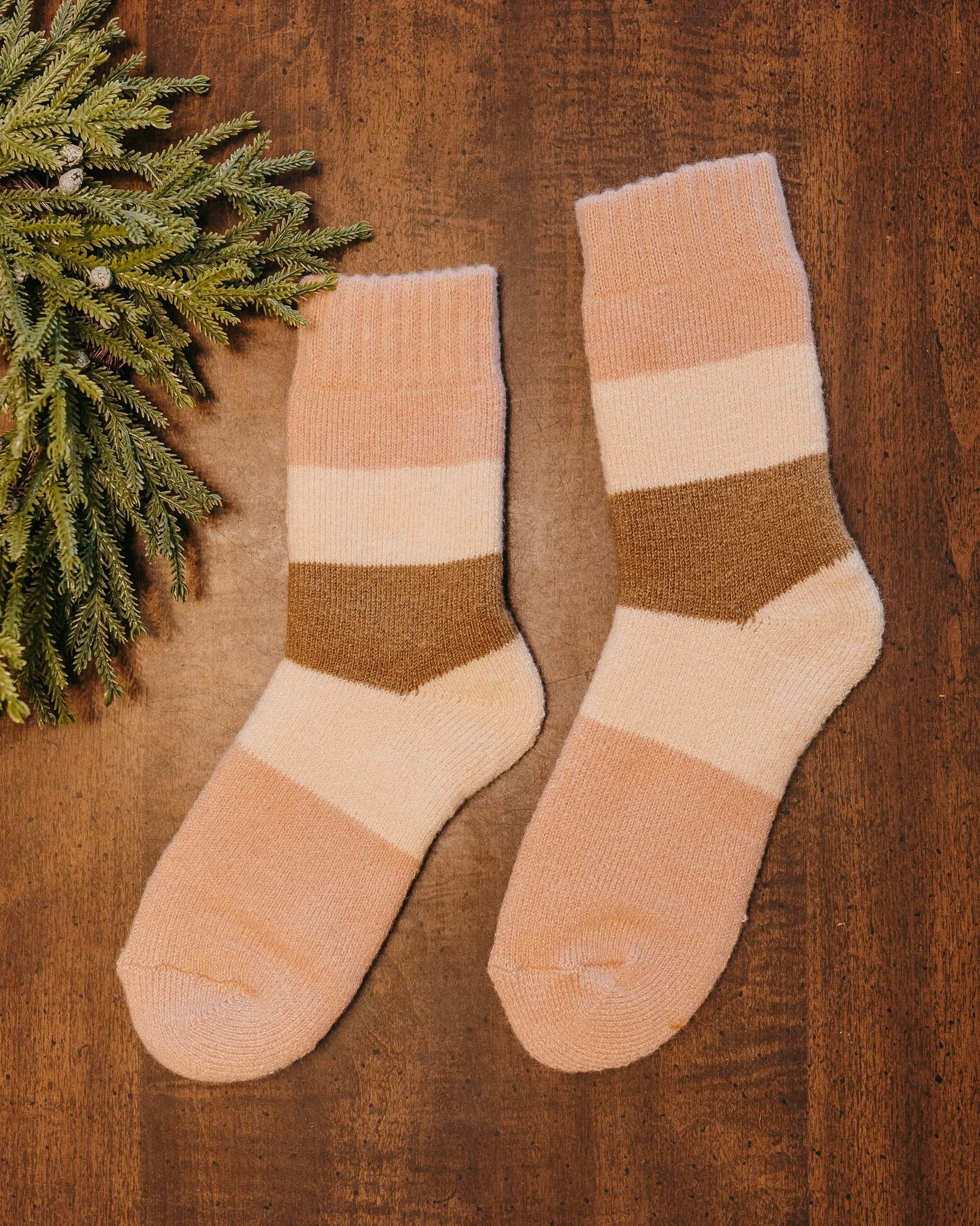 Adult socks cream and tan with chevron pattern, shown on flat lay – Little Mama Shirt Shop