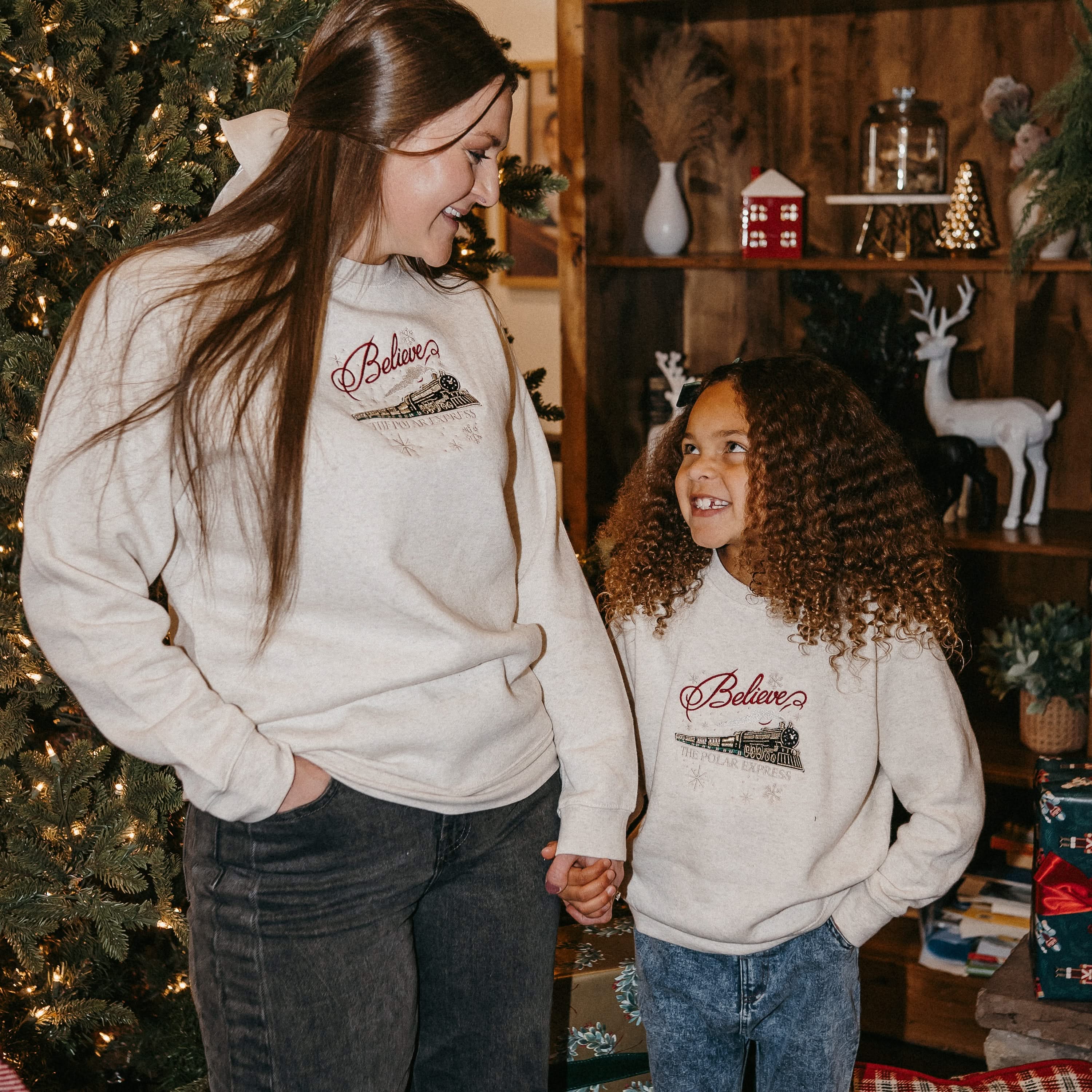 Adult and child sweater in heather with Believe Polar Express Train on front, shown on model – Little Mama Shirt Shop