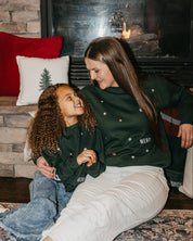 Adult and child forest sweater with 'Merry Every Thing' graphic, shown on model – Little Mama Shirt Shop