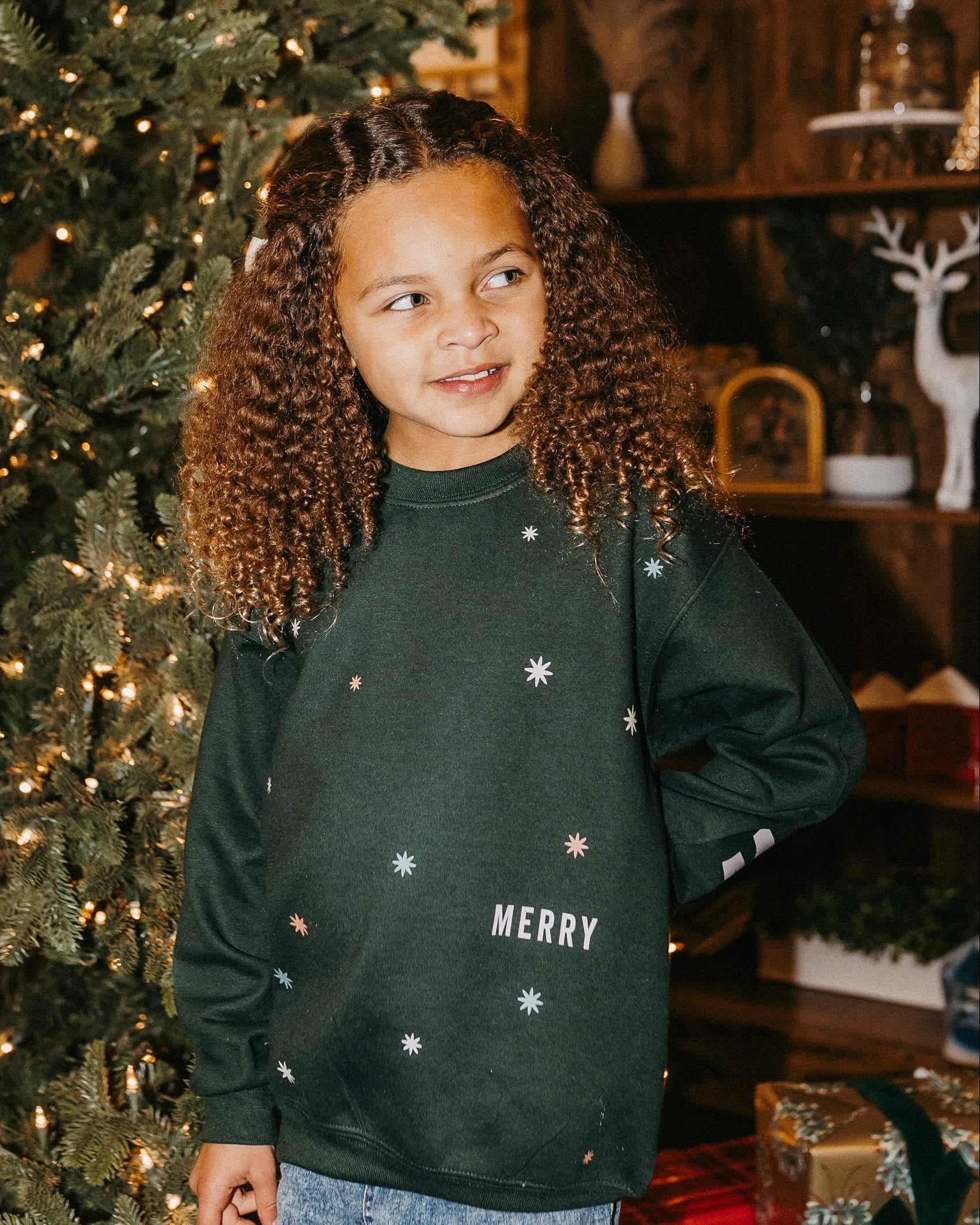 Child forest sweater with 'Merry Every Thing' graphic, shown on model – Little Mama Shirt Shop