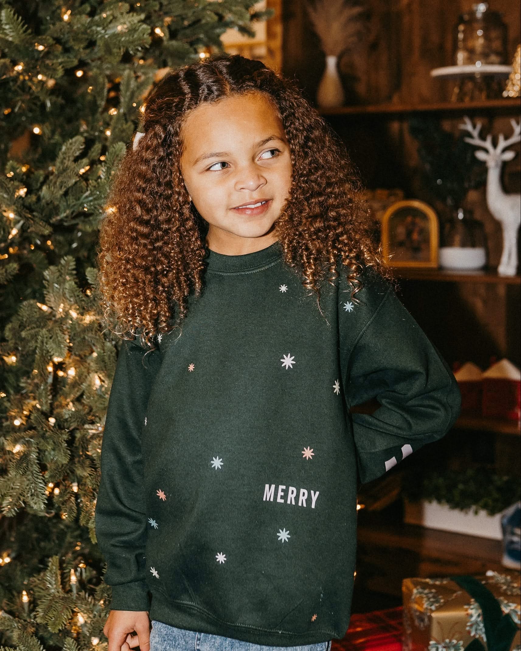 Child forest sweater with 'Merry Every Thing' graphic, shown on model – Little Mama Shirt Shop
