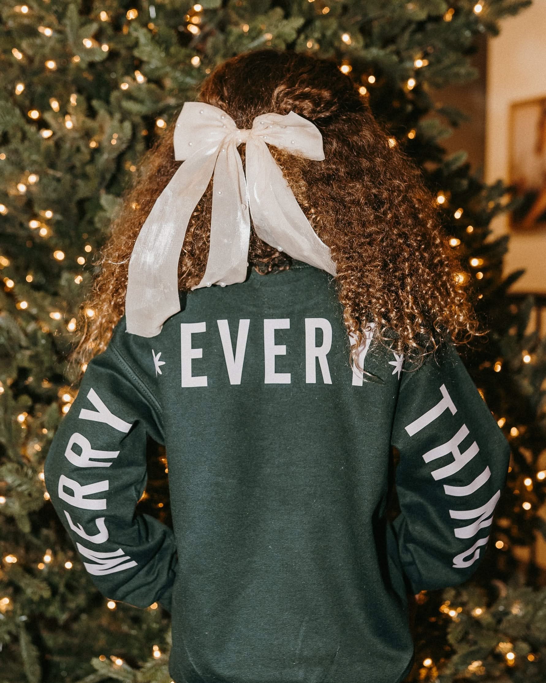 Child forest sweater with &#39;Merry Every Thing&#39; graphic, shown on model – Little Mama Shirt Shop