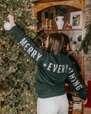 Adult forest sweater with 'Merry Every Thing' graphic, shown on model – Little Mama Shirt Shop