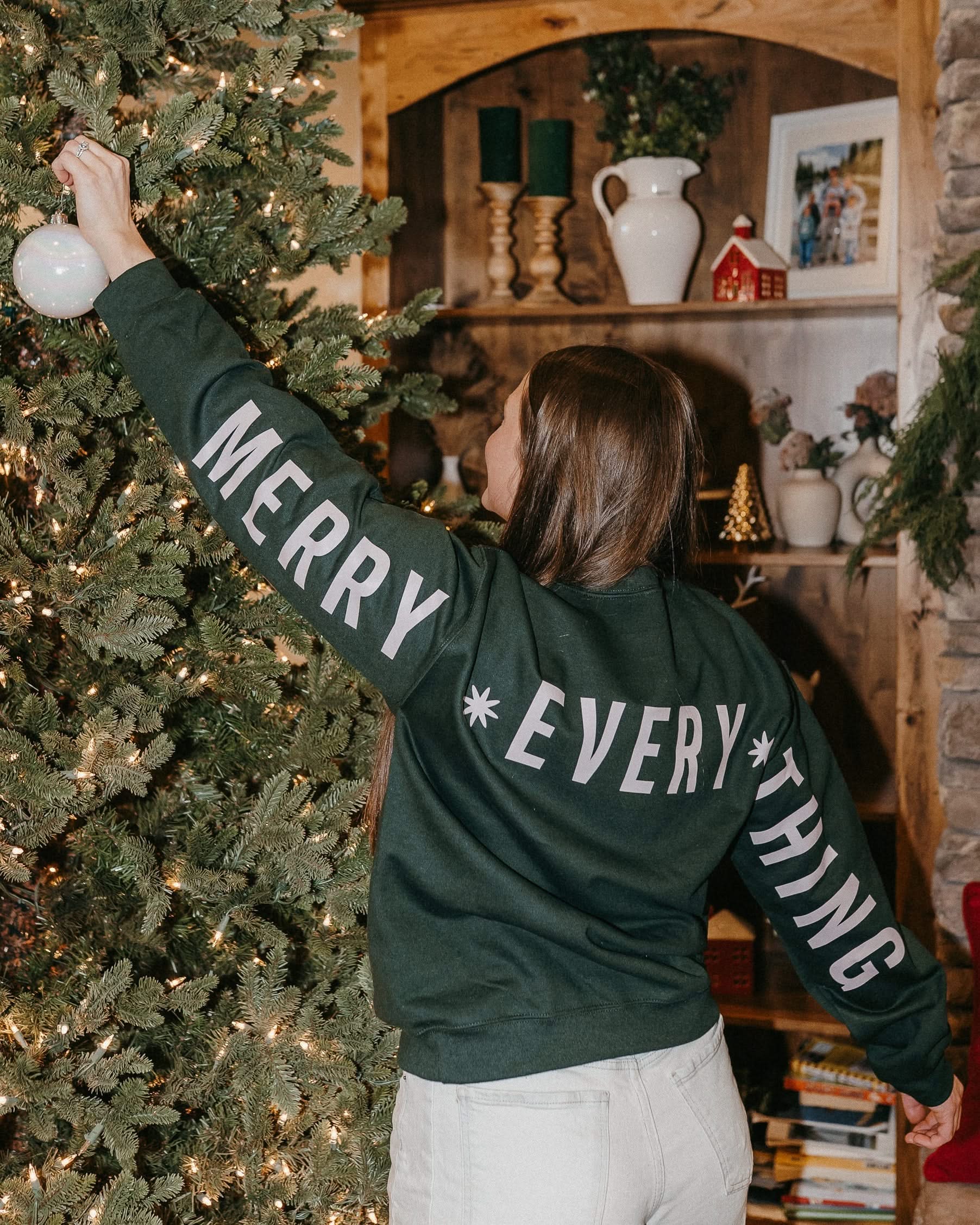 Adult forest sweater with 'Merry Every Thing' graphic, shown on model – Little Mama Shirt Shop