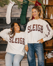 Adult mock neck sweater with varsity stripes down the arms  in white with 'sleigh' graphic on front, shown on models – Little Mama Shirt Shop