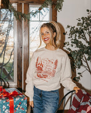 Adult basic fleece in sand with St. Nick's Christmas Tree Farm graphic on the front, shown on model – Little Mama Shirt Shop