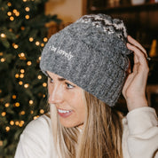 Adult beanie in gray with 'let it be lovely' design on brim, shown on model– Little Mama Shirt Shop