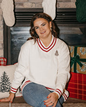 V neck sweater in white with red stripes on cuffs with embroidered Christmas tree on front, shown on model – Little Mama Shirt Shop
