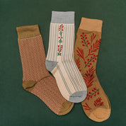 Adult socks in brown/green, cream/blue, and brown/green with chevron and holly patterns, shown on flat lay – Little Mama Shirt Shop