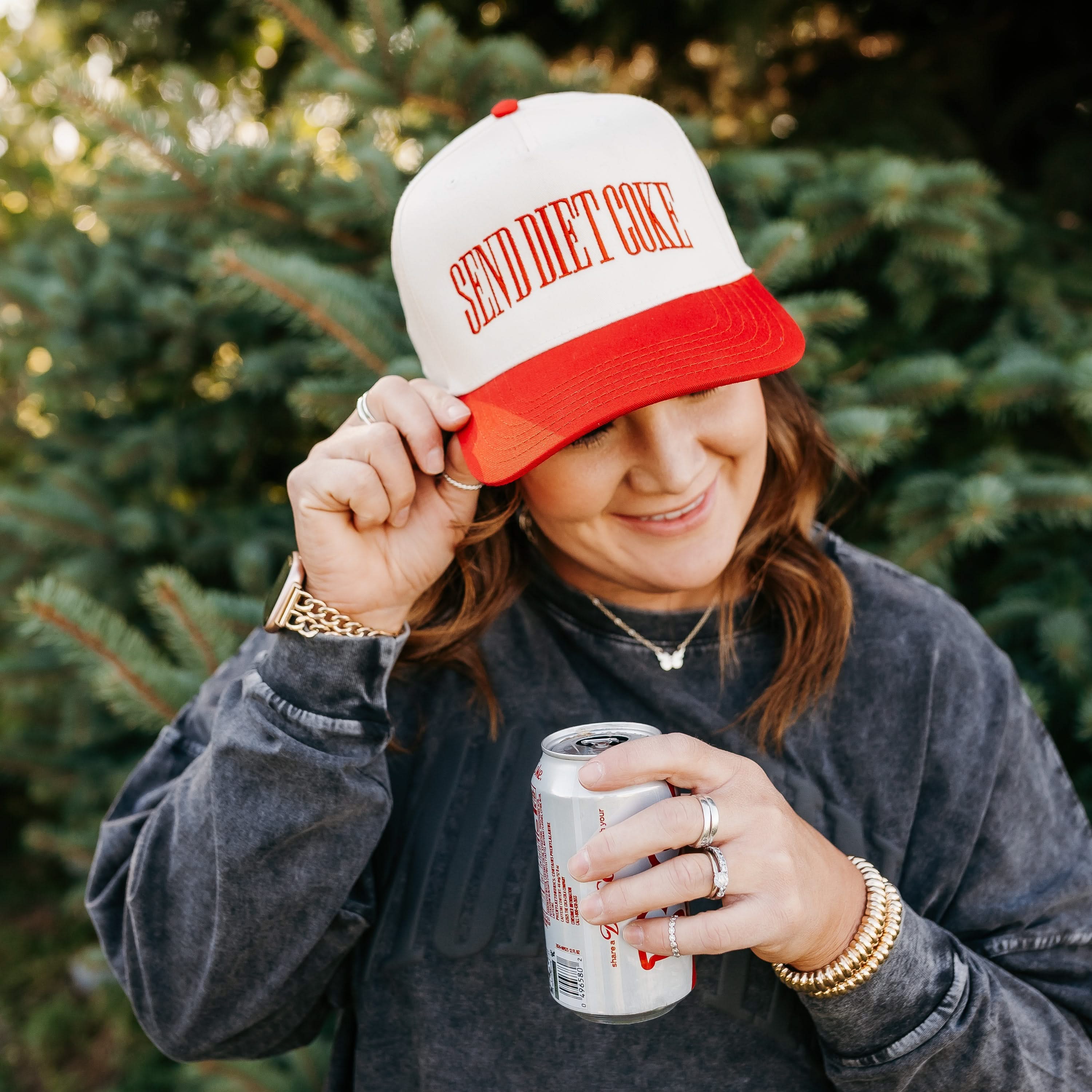 Red and cream trucker hat with bold red 'SEND DIET COKE' text, seen on model - Little Mama Shirt Shop