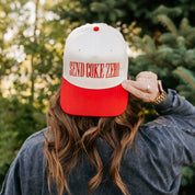 Red and cream trucker hat with bold red 'SEND COKE ZERO' text, seen on model - Little Mama Shirt Shop