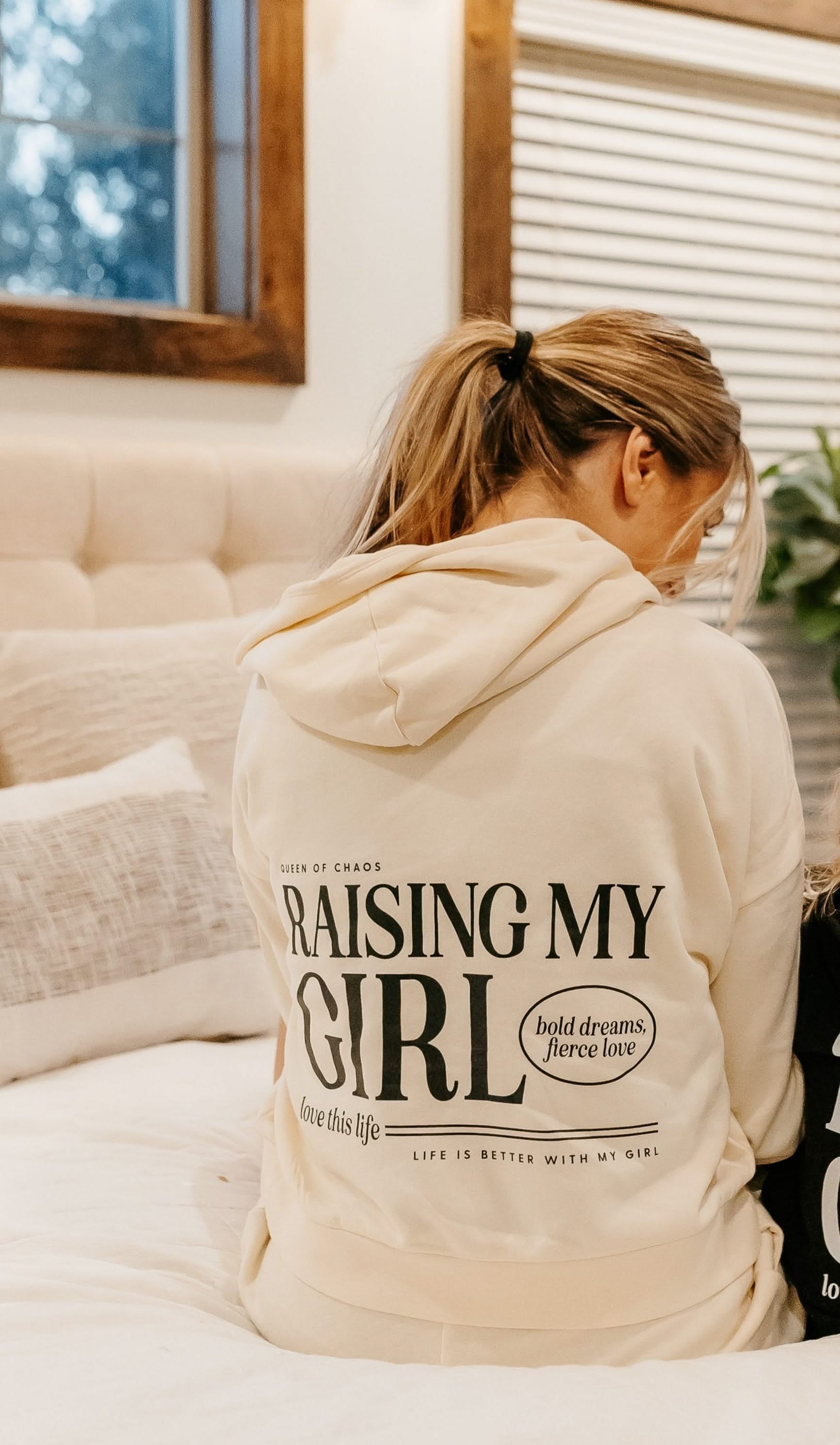 Hoodie in bone with black &#39;Raising My Girl&#39; graphic on model - Little Mama Shirt Shop