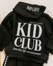 Hoodie back view in black with white 'Kid Club' graphic on flat lay - Little Mama Shirt Shop
