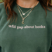 Embroidered “Will Yap About Books” pigment-dyed crewneck in pigment alpine with pink thread on model  – Little Mama Shirt Shop