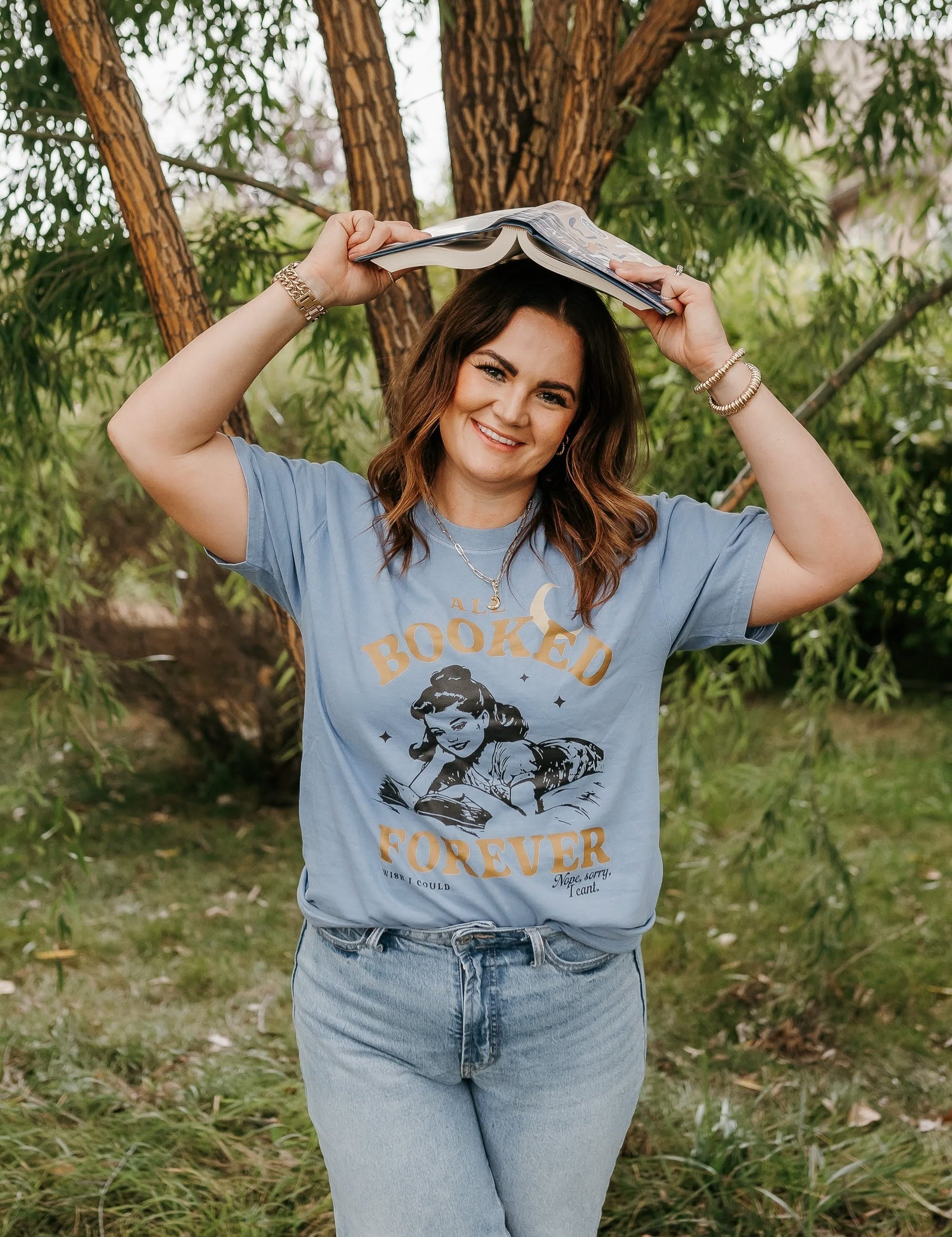 Comfort colors tee in washed denim with 'All Booked Forever' graphic, shown on model – Little Mama Shirt Shop