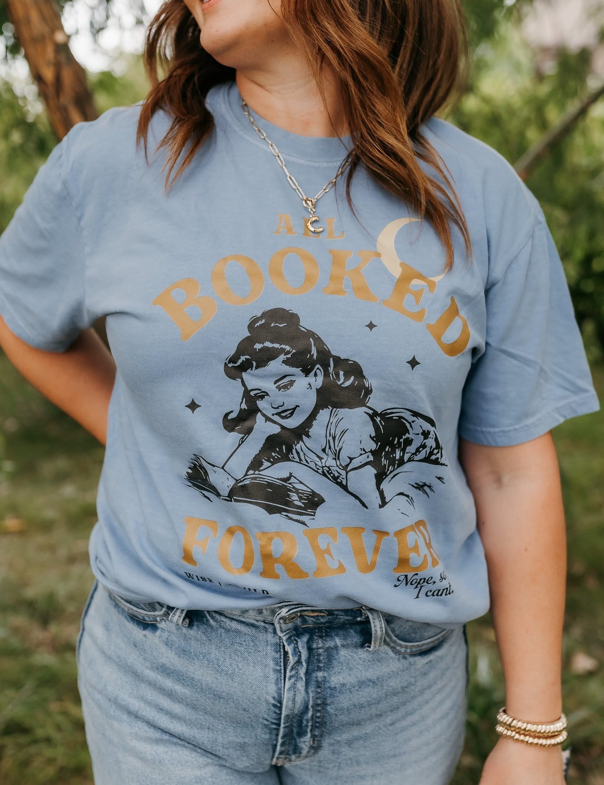 Comfort colors tee in washed denim with 'All Booked Forever' graphic, shown on model – Little Mama Shirt Shop