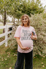 Comfort colors tee in blossom with 'Big Book Energy' graphic, shown on model – Little Mama Shirt Shop
