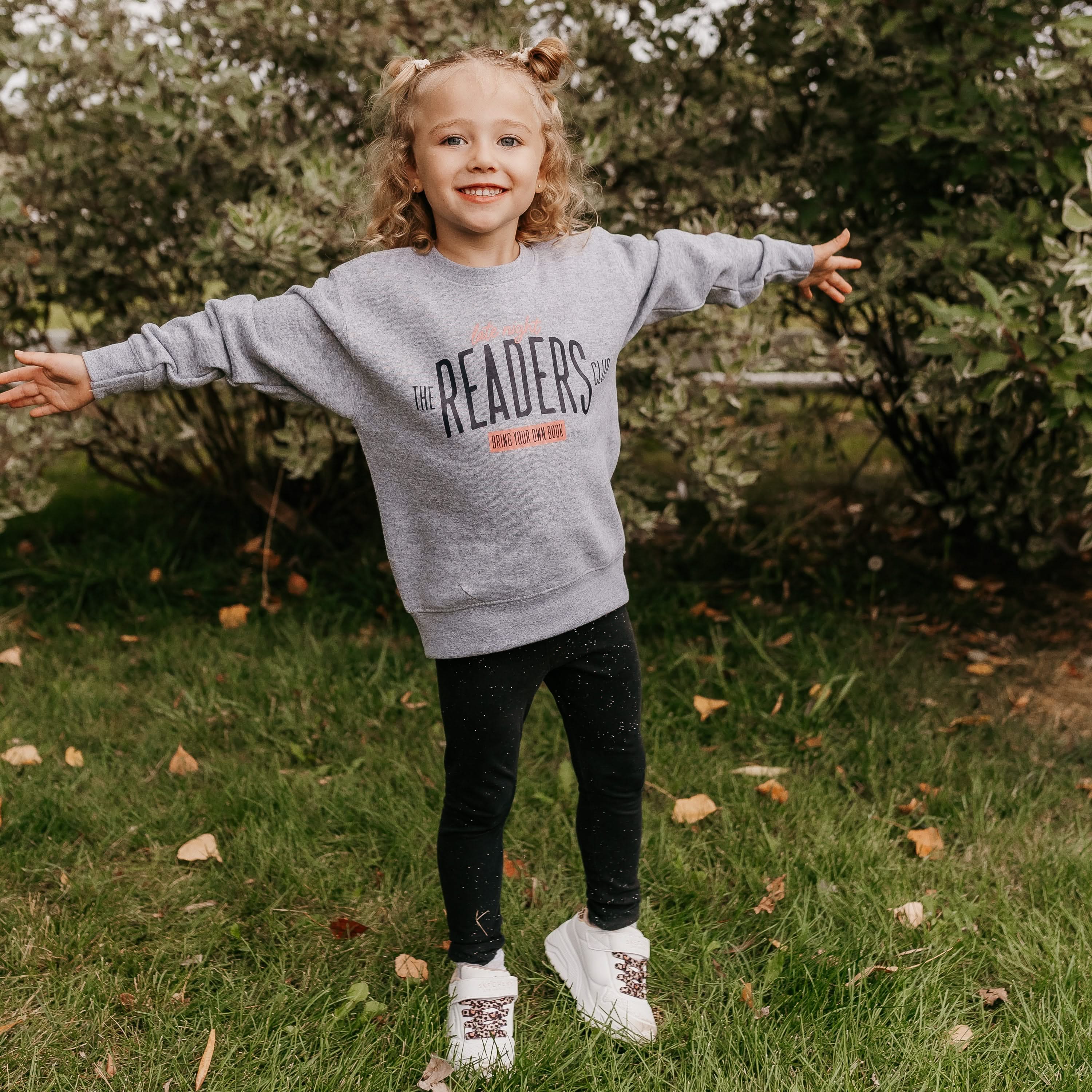 Child’s sweater with “Late Night Readers Club BYOB” design in gray, on model – Little Mama Shirt Shop