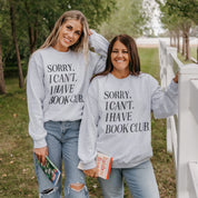 Unisex fleece sweatshirt in ash with “Sorry, I Can't. I Have Book Club.” design, on model – Little Mama Shirt Shop