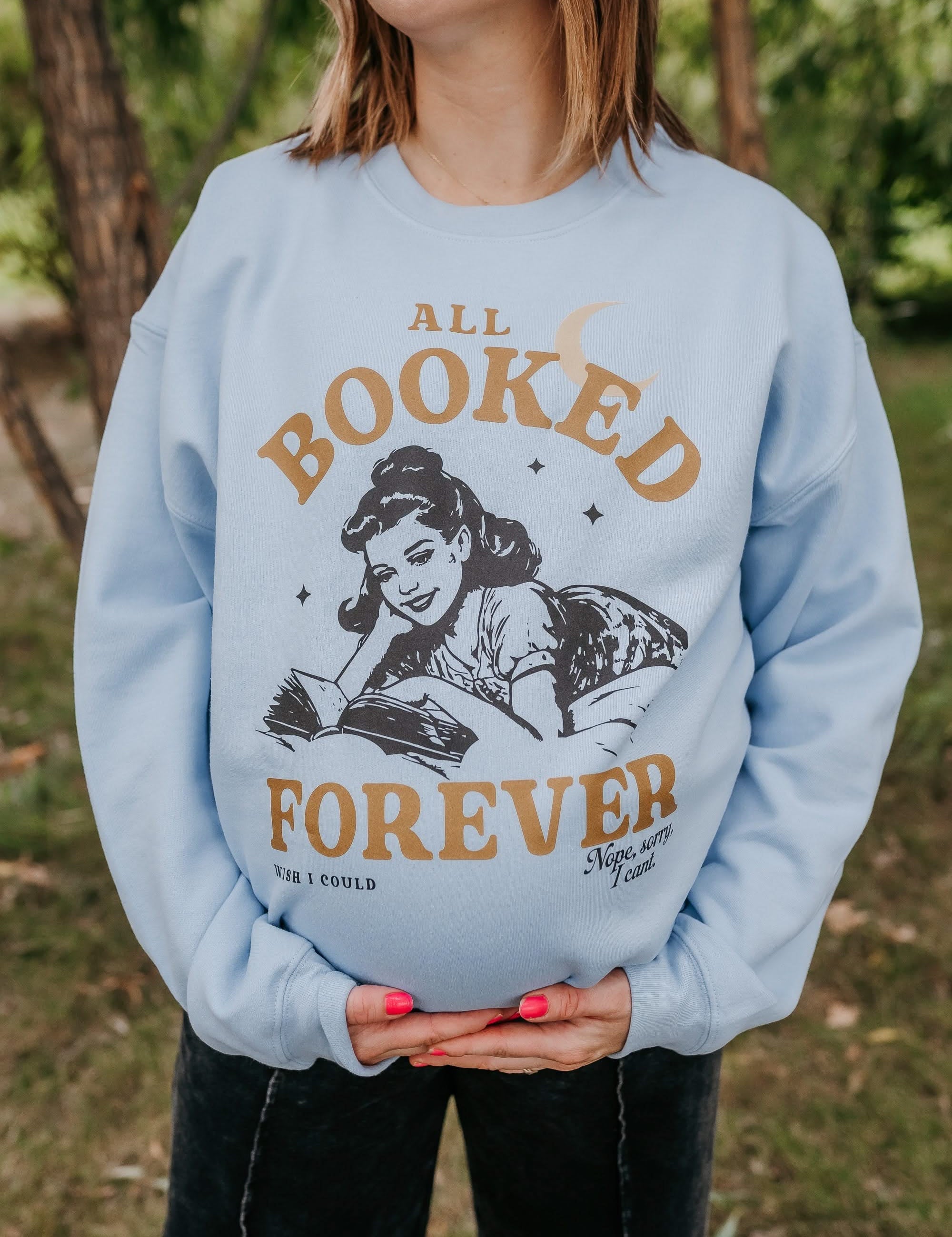 Basic fleece in light blue with 'All Booked Forever' graphic, shown on model – Little Mama Shirt Shop