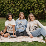 Comfort colors tee and Basic Fleece in light blue and ivory with 'All Booked Forever' graphic, shown on models – Little Mama Shirt Shop