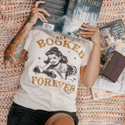Comfort colors tee in ivory with 'All Booked Forever' graphic, shown on model – Little Mama Shirt Shop