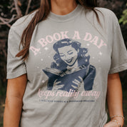 A Book A Day Keeps Reality Away - Comfort Colors Tee Little Mama Shirt Shop