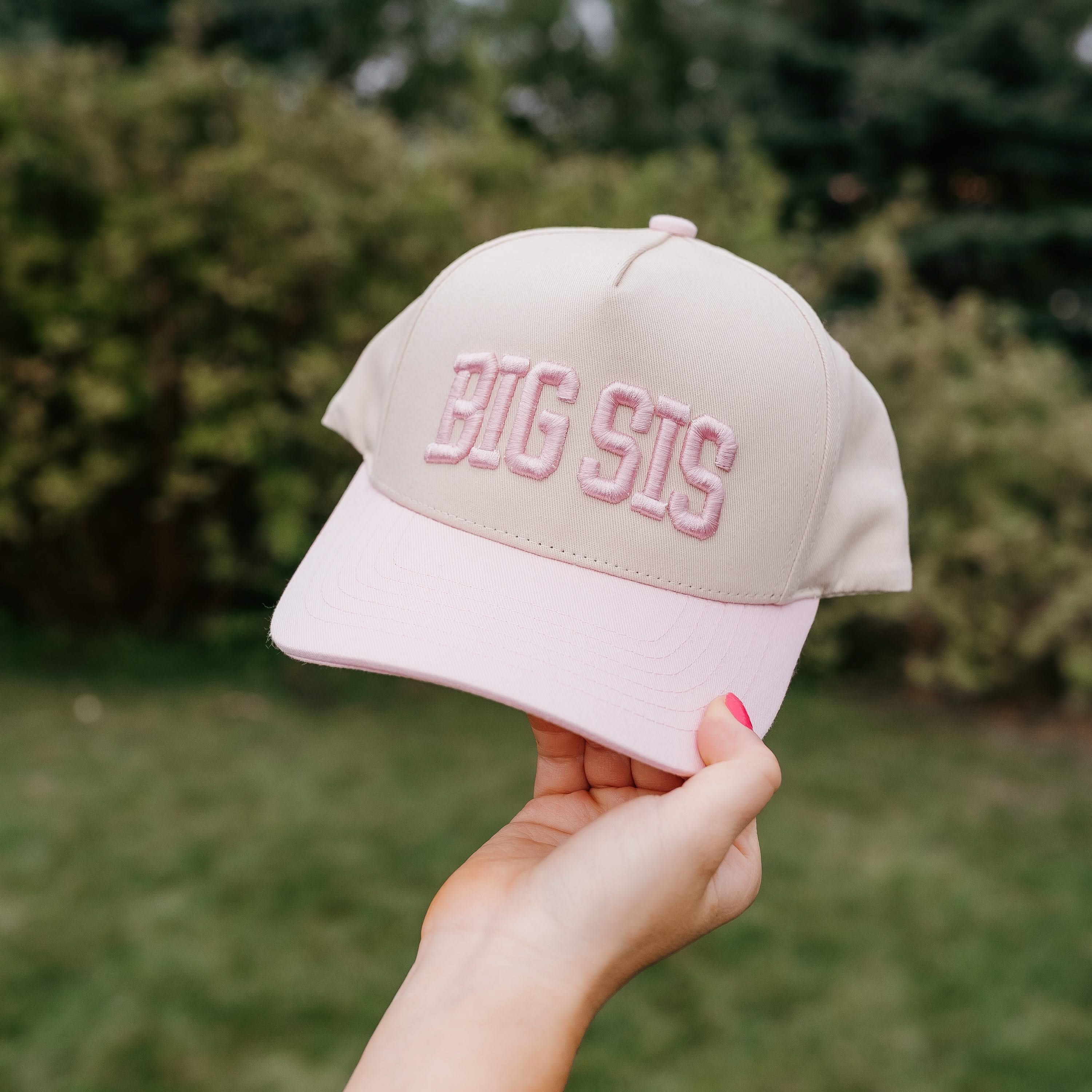 Child-size natural hat with pink bill and puff embroidered Big Sis text – Little Mama Shirt Shop