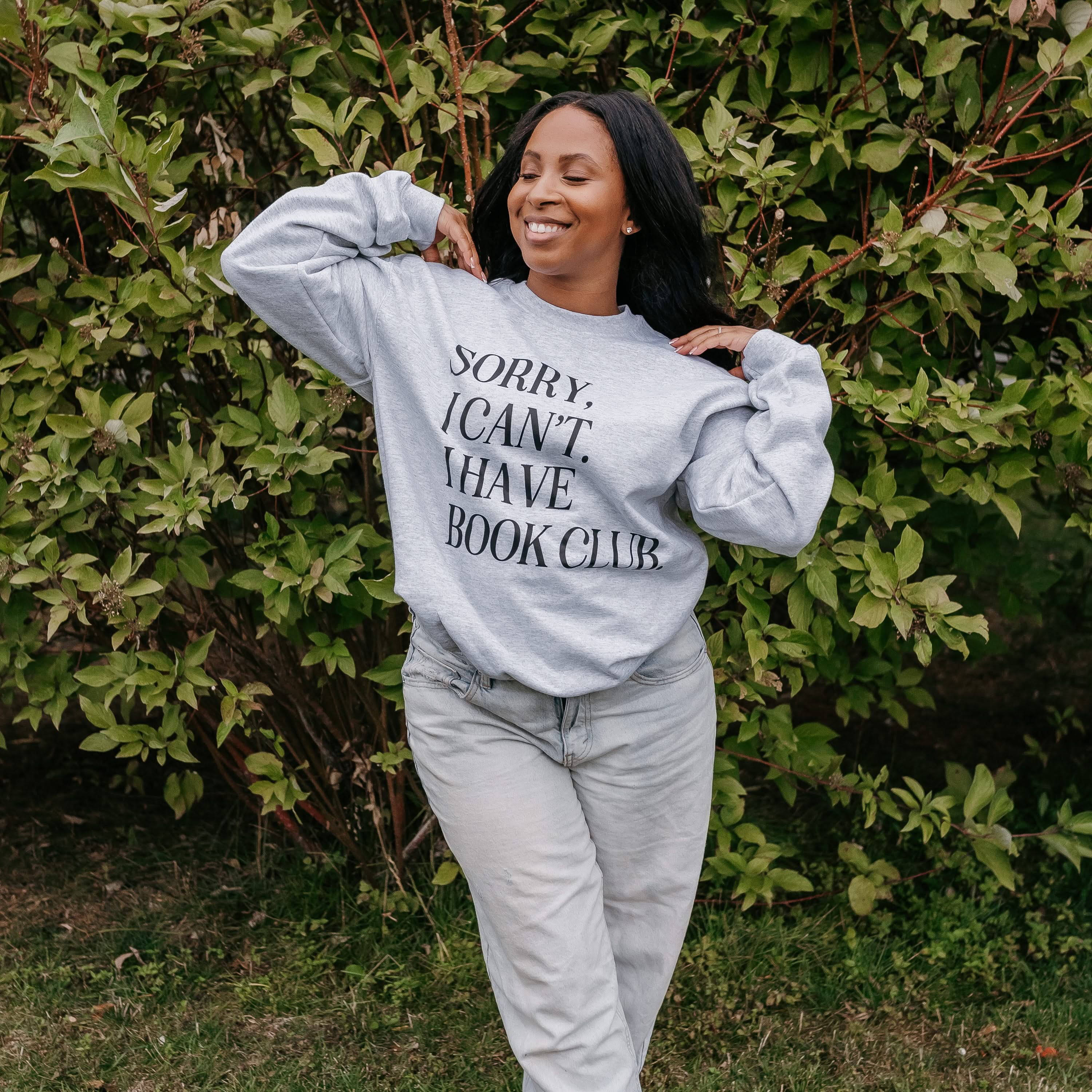 Unisex fleece sweatshirt in ash with “Sorry, I Can't. I Have Book Club.” design, on model – Little Mama Shirt Shop