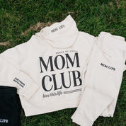 Hoodie and jogger set in bone with black 'Mom Club' graphic on flat lay - Little Mama Shirt Shop