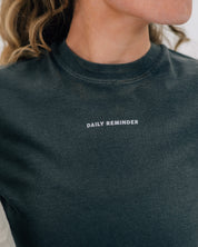 Pepper comfort colors tee with 'daily reminder' printed on front, seen on model - Little Mama Shirt Shop