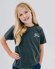 Child tee in pepper with "girl gang" design on front chest, shown on model - Little Mama Shirt Shop
