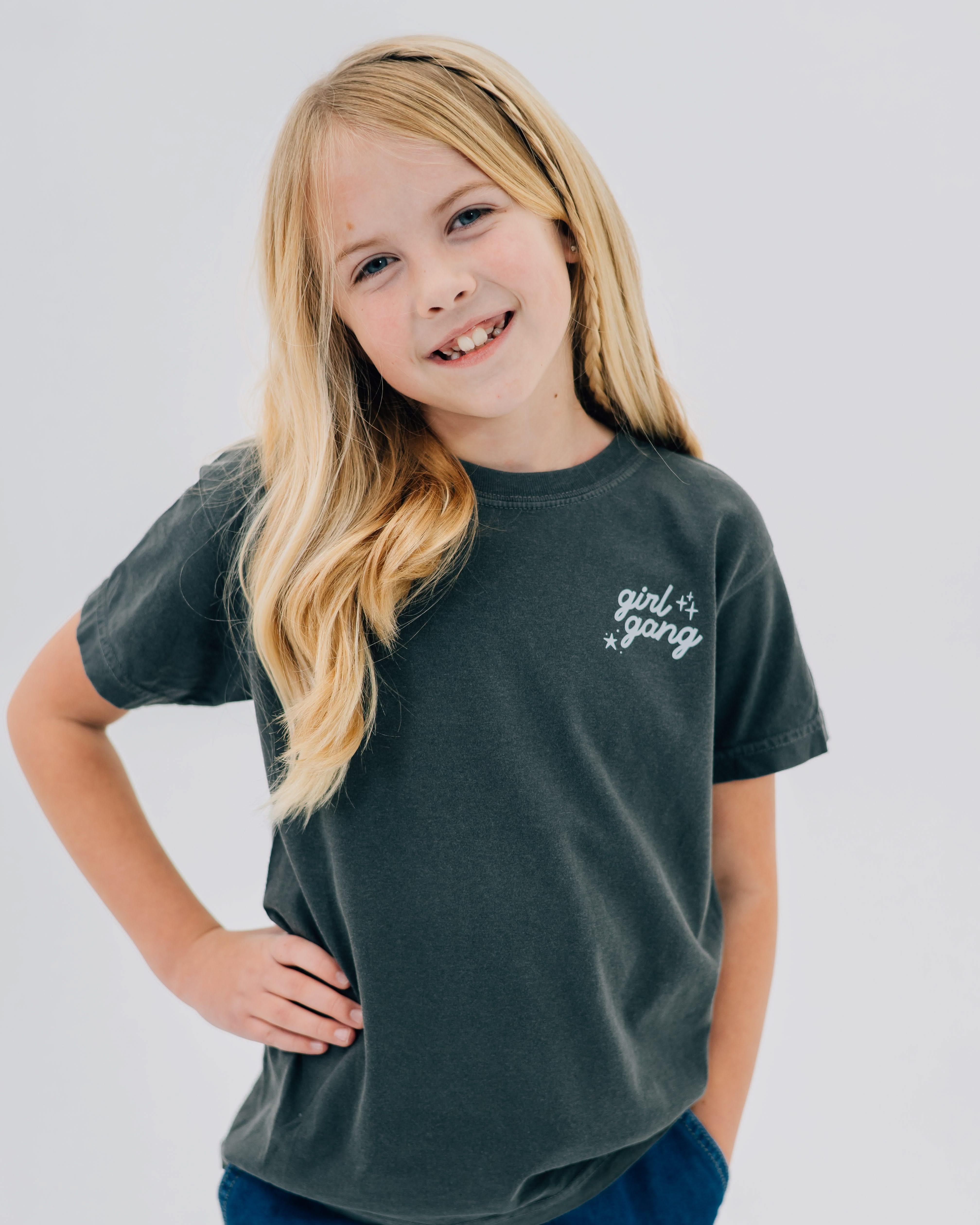 Child tee in pepper with "girl gang" design on front chest, shown on model - Little Mama Shirt Shop