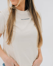 Ivory comfort colors tee with "daily reminder" printed on front chest, seen on model - Little Mama Shirt Shop