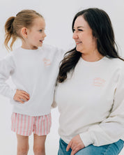 Adult and child sweater in white with "long live" design on front chest, shown on models - Little Mama Shirt Shop