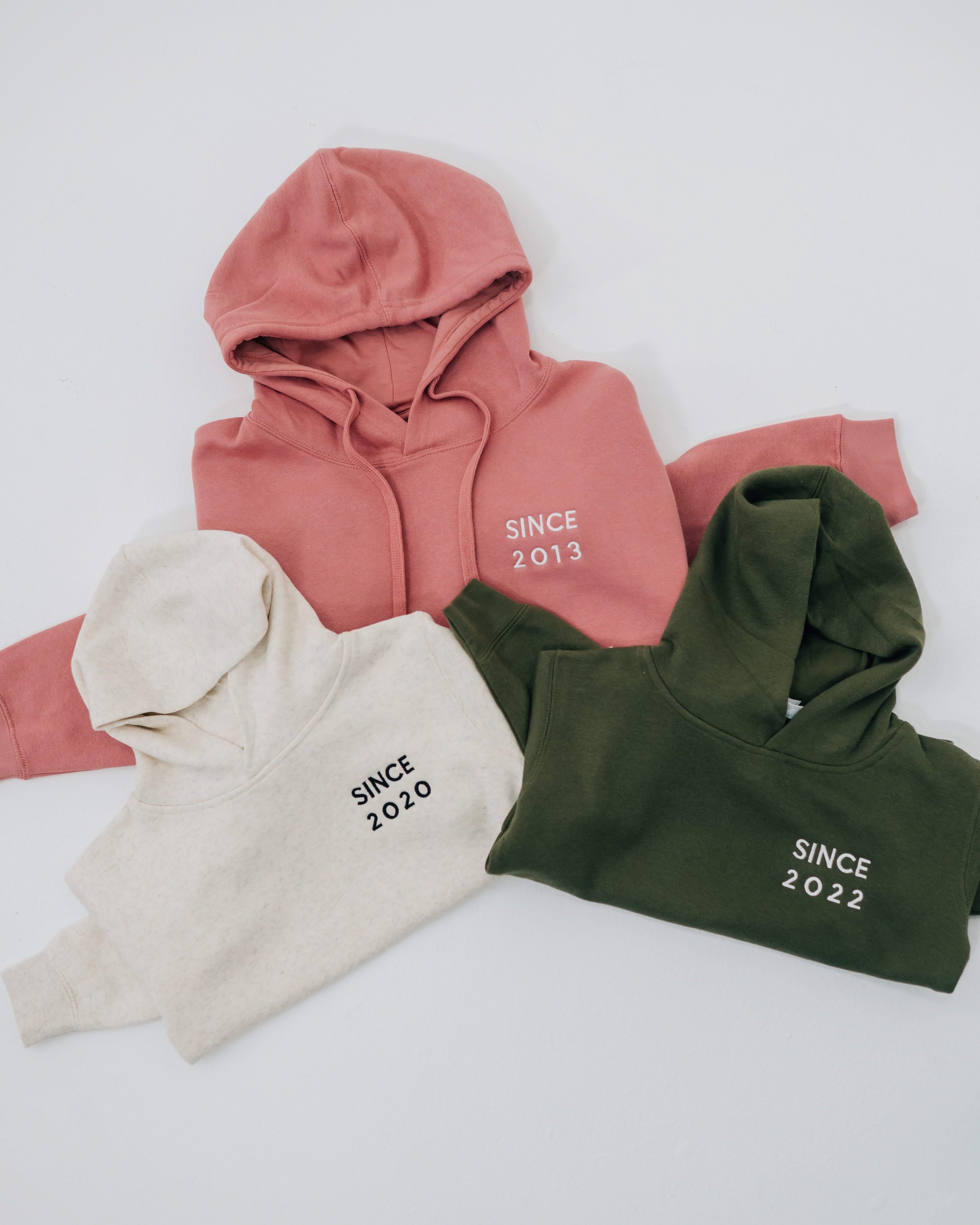 Motherhood Elevated Fleece Hoodie – Customizable Year Embroidery | Little Mama Shirt Shop Little Mama Shirt Shop LLC