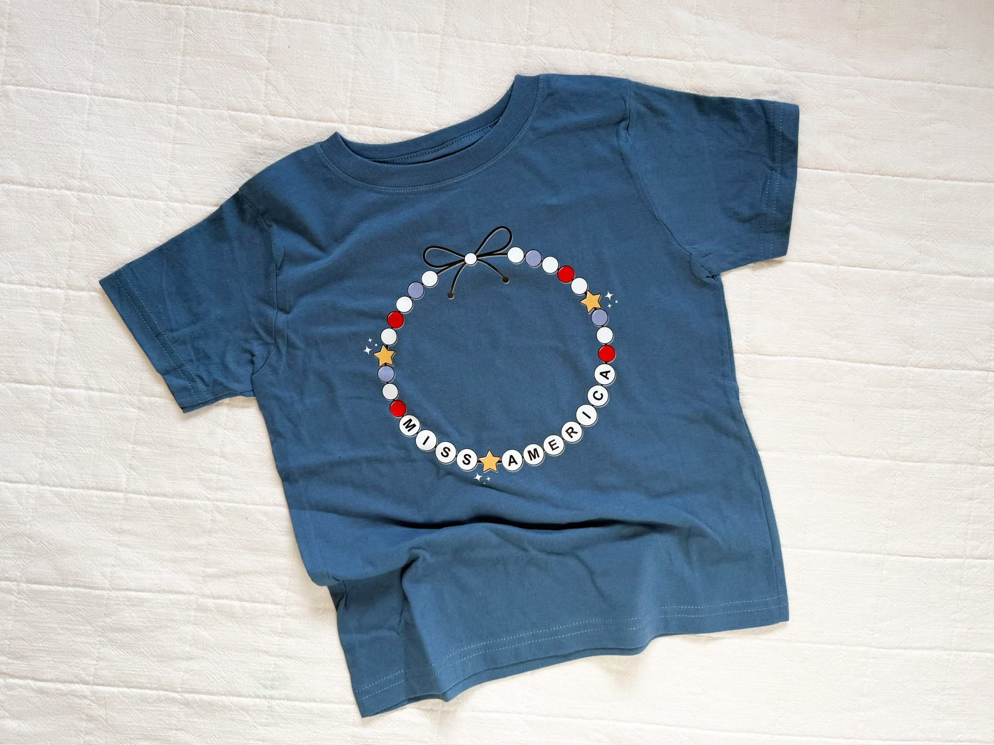 Miss America Beaded Bracelet Graphic T-Shirt - Toddler Little Mama Shirt Shop LLC