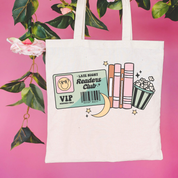 Beige canvas tote bag featuring a 'Late night readers club' design on a flat lay - Little Mama Shirt Shop