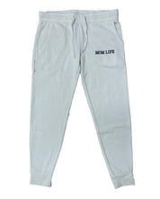 Joggers in bone with black 'Mom Life' graphic on flat lay - Little Mama Shirt Shop